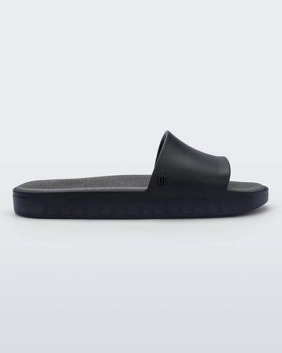SIde view of black Melissa Beach slide.