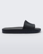 SIde view of black Melissa Beach slide.