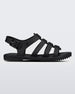 An outter side view of a black Melissa Flox sandal with straps.