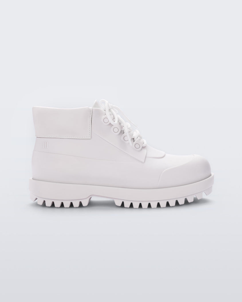 Side view of a matte white Melissa Ares combat boot with a matte white base, laces, top back and sole.