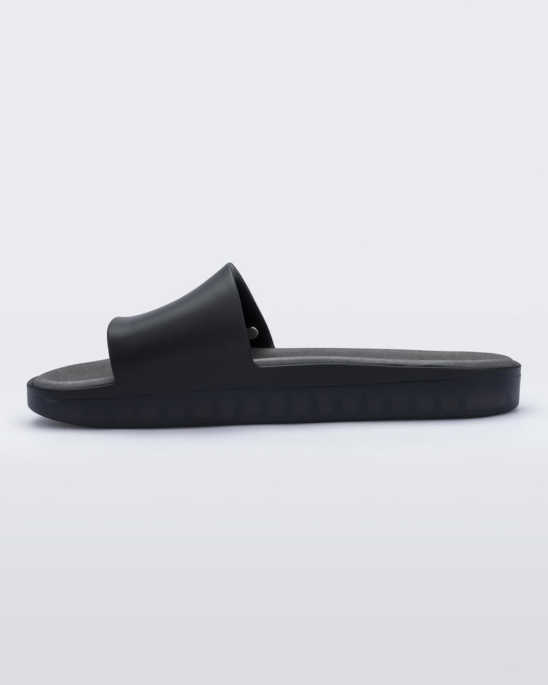 InsIde view of black Melissa Beach slide.