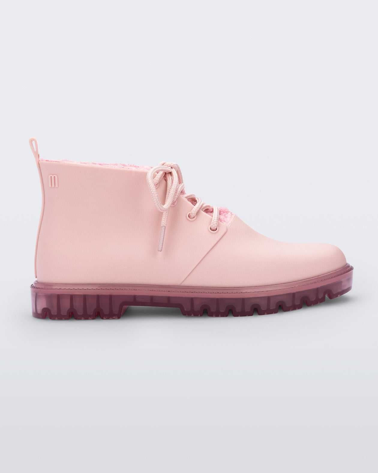Side view of a pink Melissa Fluffy Boot with laces and a rubber sole.